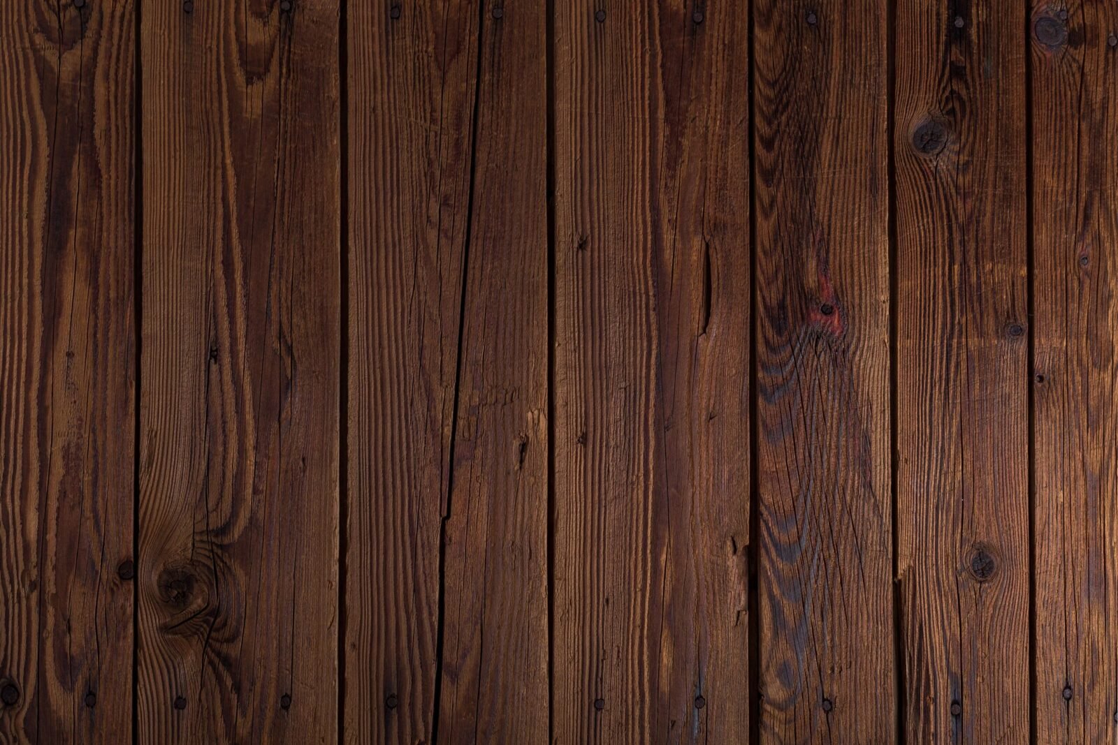 High-quality rustic wooden wall texture, perfect for backgrounds.